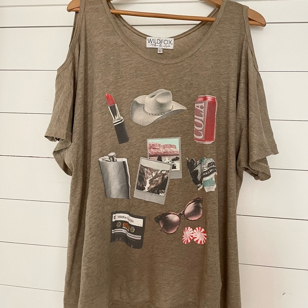 Wildfox, cold shoulder taupe top. Retro images of cola, lipstick,cowboy hat